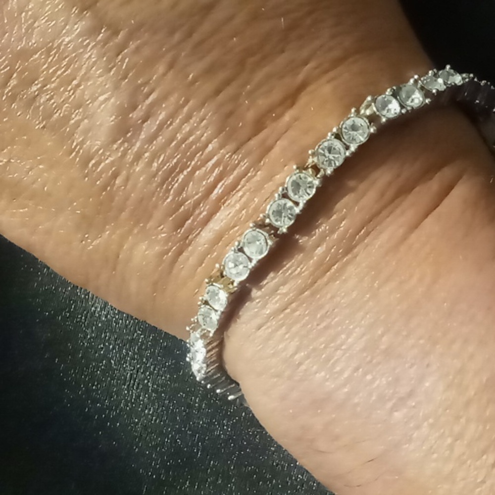 Silver tone tennis bracelet large chunky crystals .